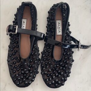 Alaia Black Studded Flats